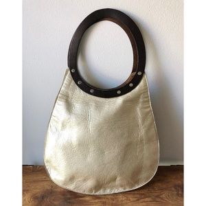 Dean Genuine leather Teardrop Bag — Platinum